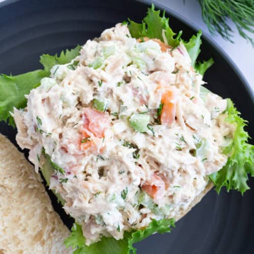 Smoked salmon tuna atop a bottom slice of Ciabatta bread.