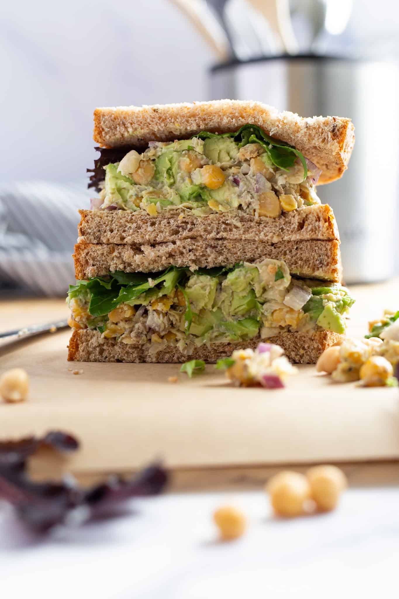 Smashed chickpea salad sandwich with sardines.