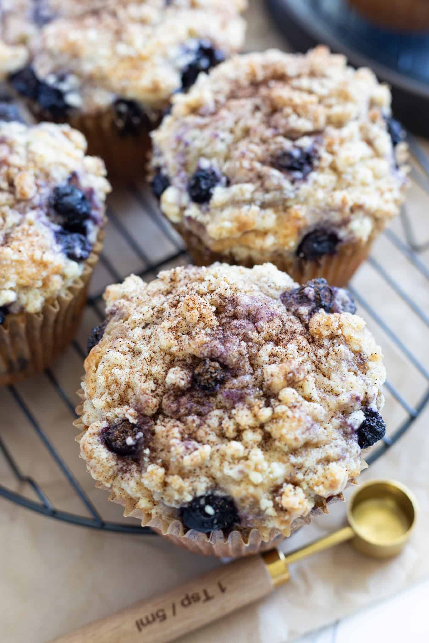 A rack of blueberry streusel muffins.