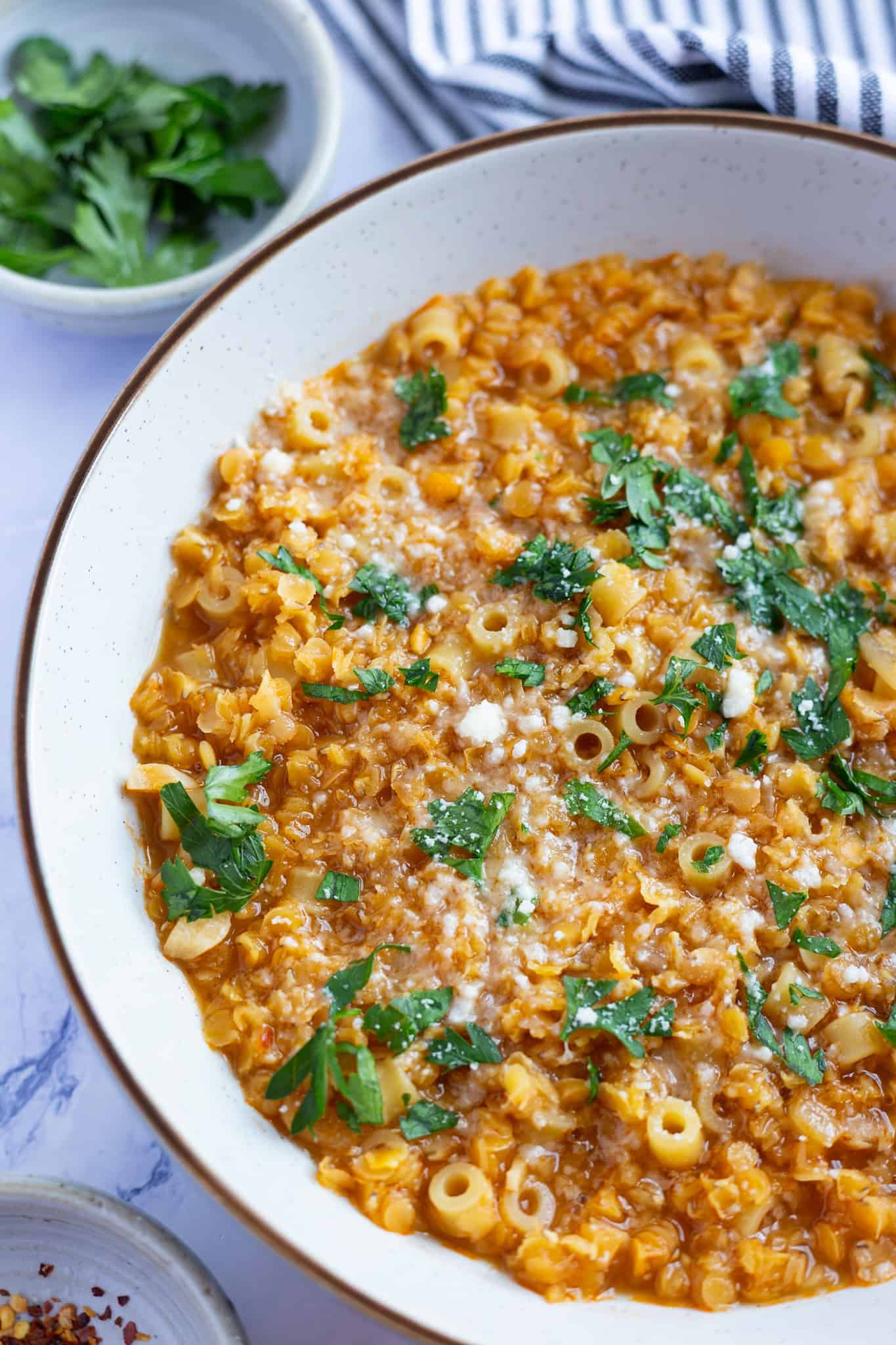 A hearty bowl of Italian lentil soup with pasta.