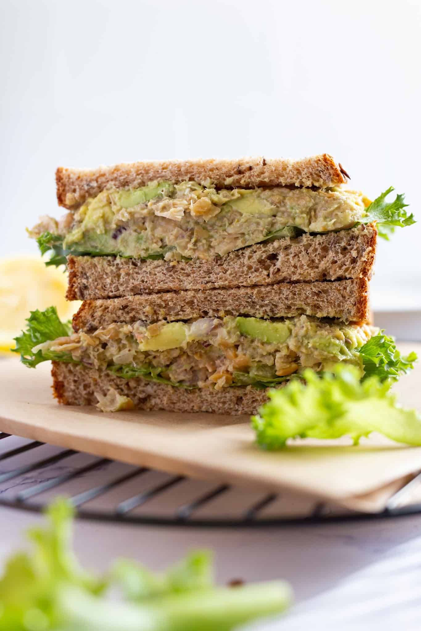 Smashed chickpea salad sandwich with sardines.