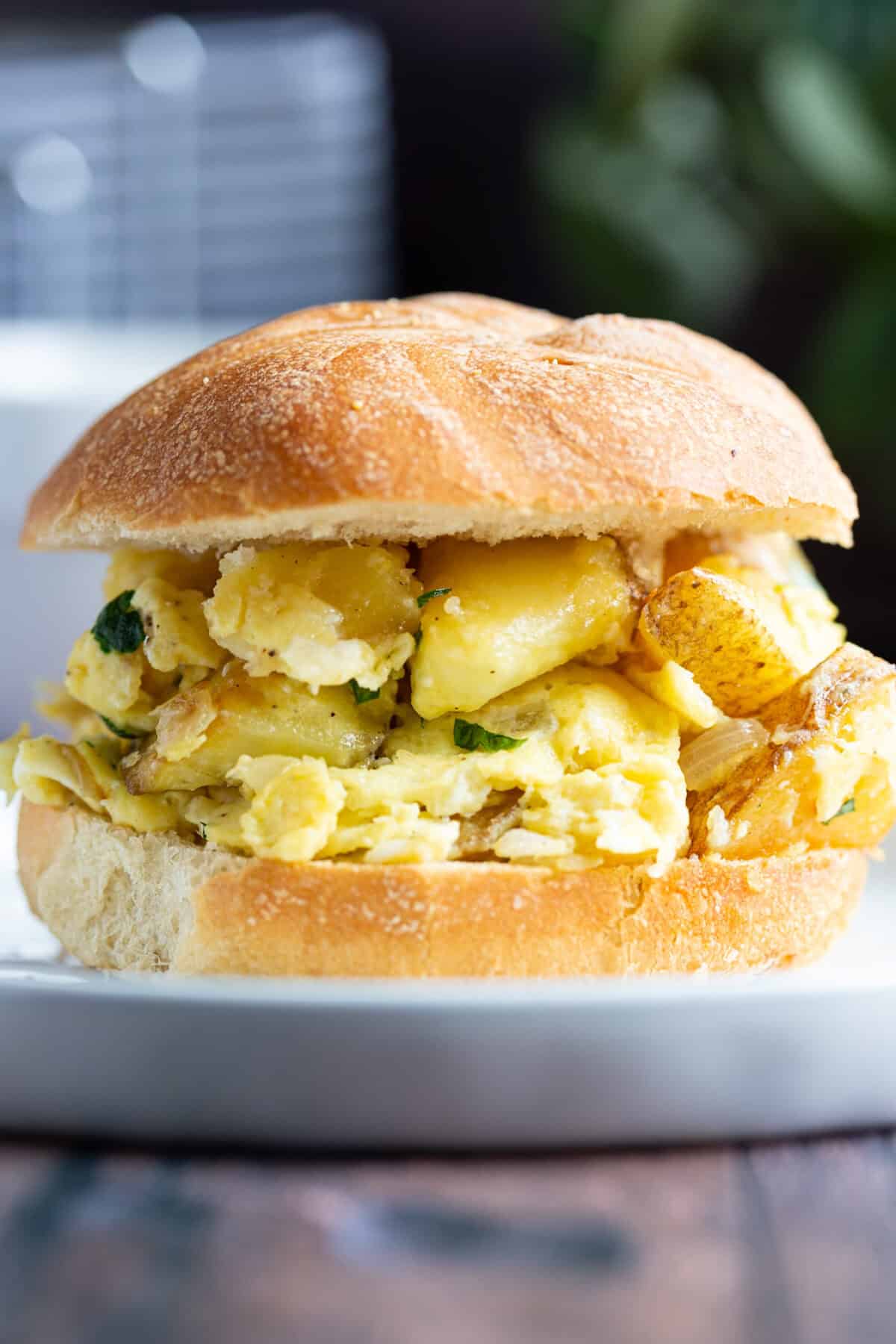 A sandwich roll stuffed with Italian potatoes and eggs.